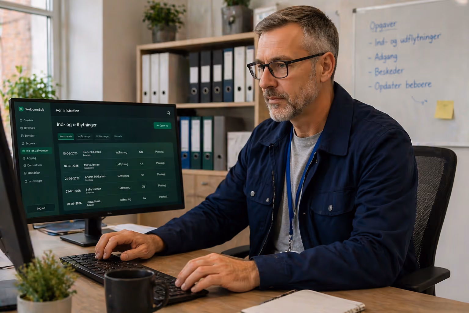Administrator arbejder med WelcomeBob Adminpanel på sin computer